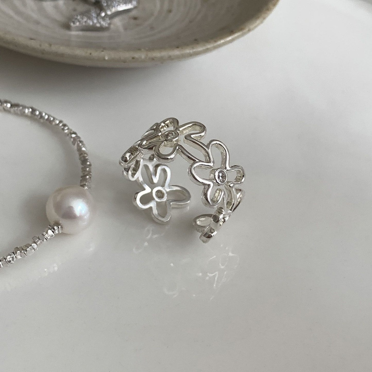 Designer white gold plated rings. Select one or multiple styles to combine.
